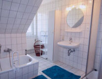 sink, indoor, bathtub, wall, plumbing fixture, shower, tap, bathroom, toilet, floor, bathroom accessory, mirror, design